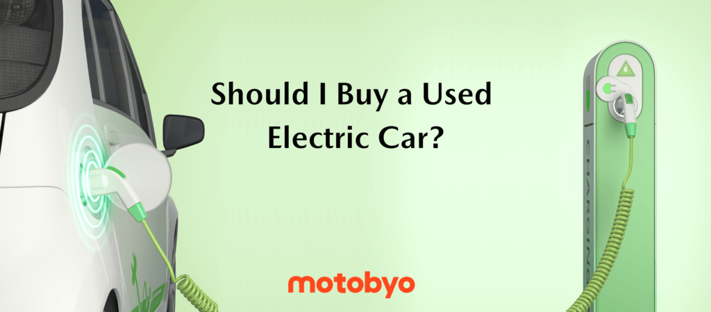 electric car plugged in. article title: Should I buy a used electric car?