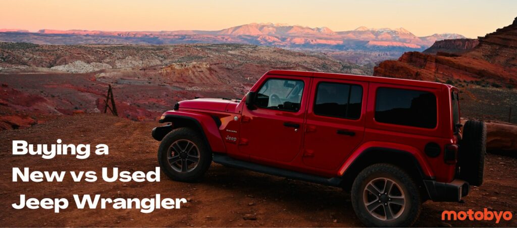 red jeep wrangler by edge of a beautiful canyon ant sunset
