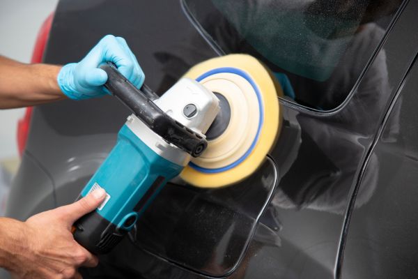 buffing out imperfections of black car